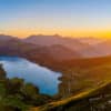 Coucher de soleil sur le Lac de Roselend, reflets dorés et paysages alpins - Vente de photos par Gaëtan Michel